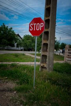 Stop sign in the intersection Stock Photos