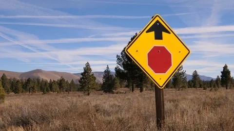 Stop sign in mountains Stock Footage 92509124