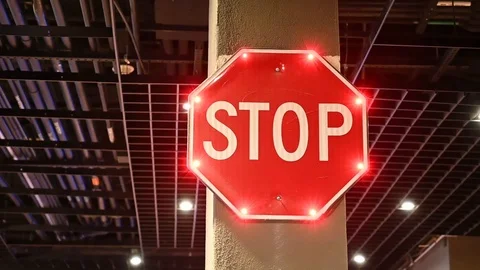 STOP Sign with Red Blinking Lights Stock Footage 119582215