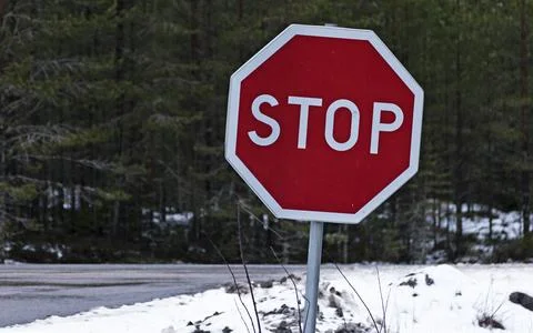 Stop sign in traffic at intersections Stock Photos