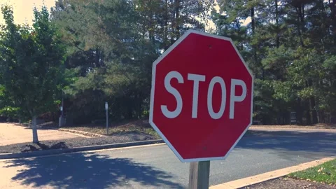 Stop Sign, turn to reveal a second Stop Sign 動画素材 141463282