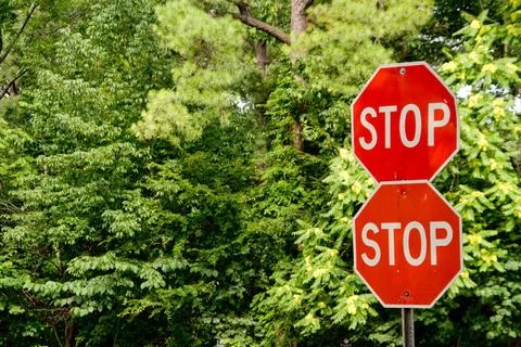 Stop Signs An intersection where they want you to REALLY stop. Copyright: ... Stock Photos