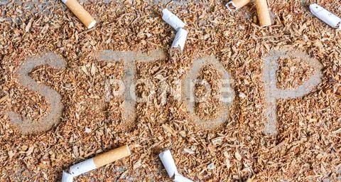 Stop Smoking Background With Tobacco And Cigarettes