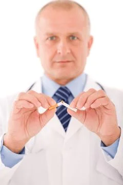 Stop smoking mature male doctor break cigarette Stock Photos