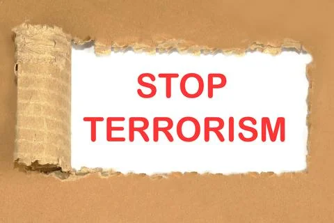Stop Terrorism a text on paper calling for an end to violence against humanit Stock Photos