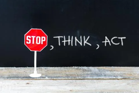 STOP, THINK, ACT message written on chalkboard Stock Photos