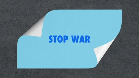 Stop War message written on a Fluttering blue Paper Stock Footage 173041992