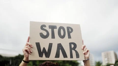 Stop war protest. Woman in crowd fighting against Israel and Palestine conflict Stock Footage 254490286