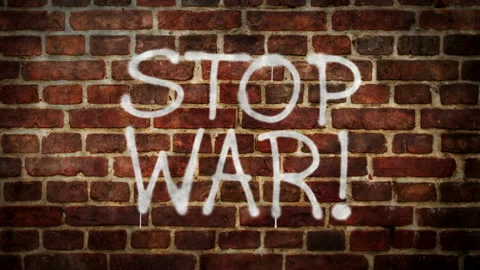 Stop war spray painted on the brick wall Stock Footage 171412173