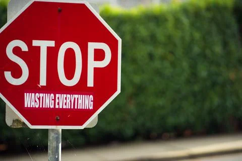 Stop wasting everything. Stop sign stop wasting everything sticker Stock Photos
