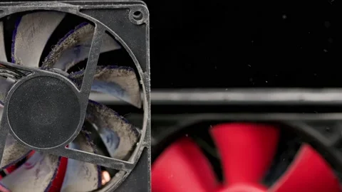 Stopped dusty 90 mm pc fan close-up with flying dust particles Stock Footage 164089408