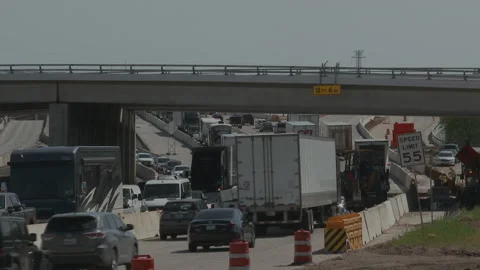 Stopped highway traffic in construction zone at an entrance ramp, 4K. Video stock 151597458