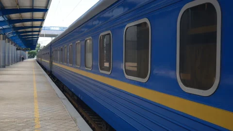 Stopping inside the station passenger train on the landing platform Stock Footage 111395075