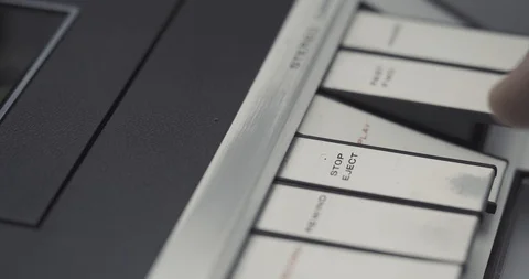 Stopping PLAY and EJECT button on retro audio cassette tape player recorder Stock Footage 121188208