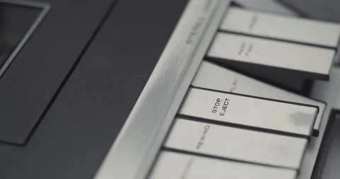 Stopping play and ejecting a tape on retro audio cassette tape player recorder 스톡 동영상 121188195