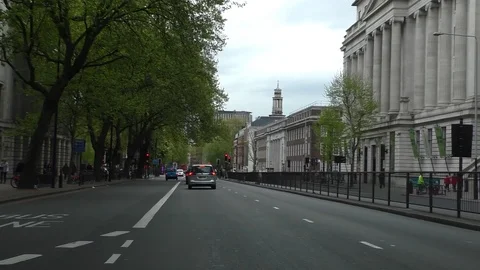 Stopping at traffic lights by Euston station in London Stock Footage 90034848