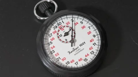 Stopwatch close up black dark background concept value of time Stock Footage 202111585