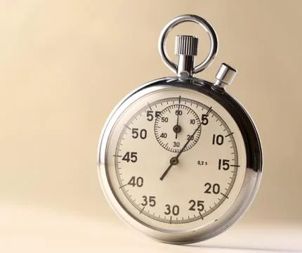 Stopwatch closeup on beige background 스톡 사진