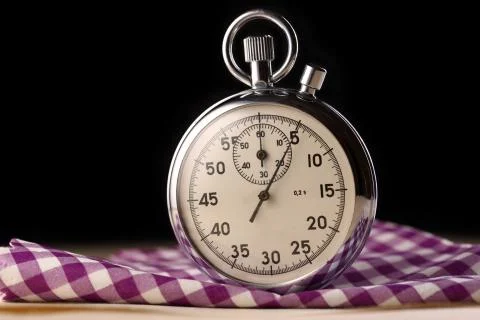 Stopwatch closeup on black background Stock Photos