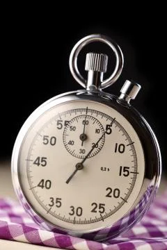 Stopwatch closeup on black background 写真素材