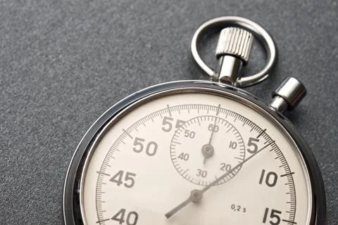 Stopwatch on the grey background 스톡 사진