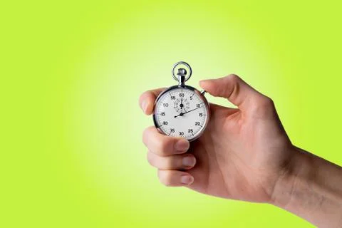 Stopwatch hold in hand, button pressed Stock Photos