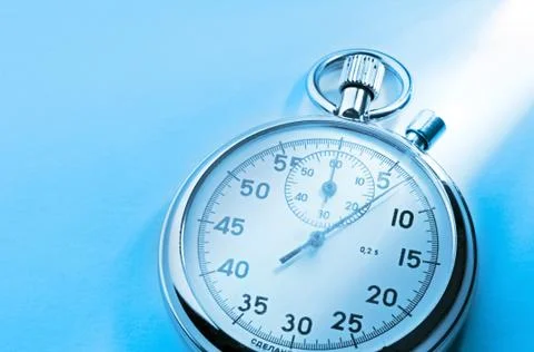 Stopwatch isolated on blue 写真素材