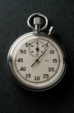 Stopwatch isolated on dark Foto stock
