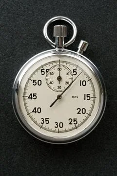 Stopwatch isolated on dark Foto stock