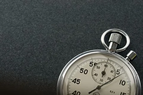 Stopwatch isolated on dark Stock Photos