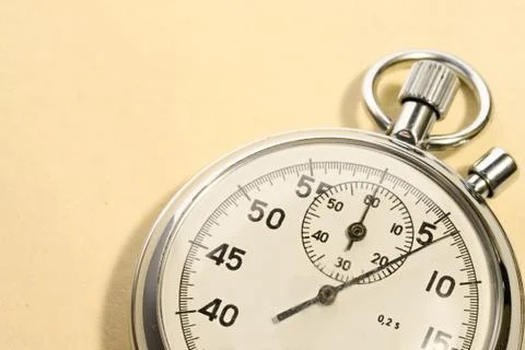 Stopwatch isolated on yellow Stock Photos