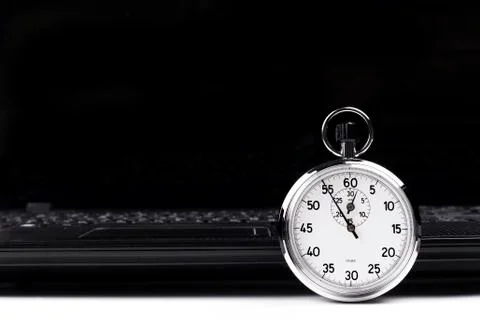 Stopwatch laptop Stock Photos