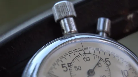 Stopwatch lies on bench, time shift concept Stock Footage 93653675