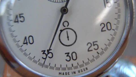 Stopwatch lies on bench, time shift concept Stock Footage 93653863