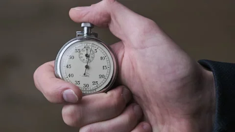 Stopwatch in Male Hand Counts Down Seconds Stock Footage 174294134