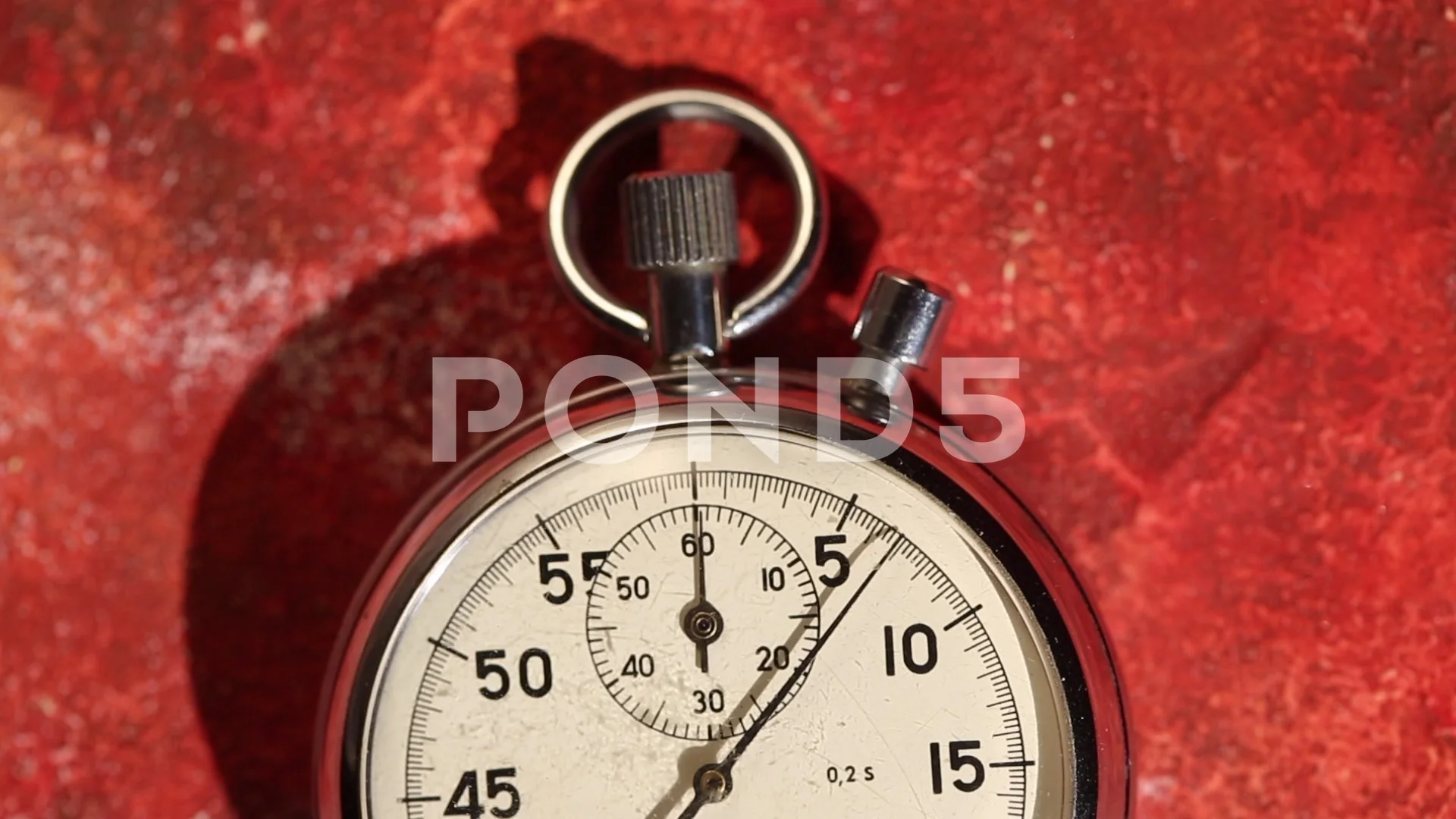 clock or stopwatch. pocket watch on a dark blue background.