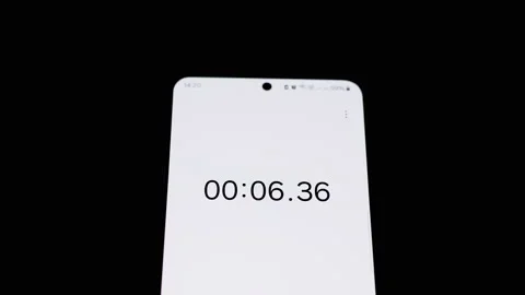 Stopwatch Timer on White Phone Screen Stock Footage 293289157