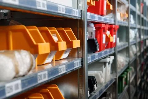 Storage bins and racks in a modern warehouse Stock Photos