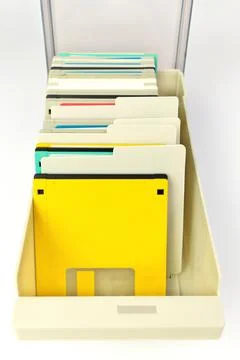 A storage box of 3.5 Inch Floppy disks for background. Retro digital storage Stock Photos
