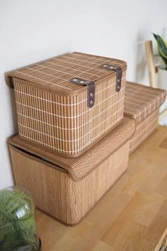 Storage boxes stacked in a simple room Stock Photos