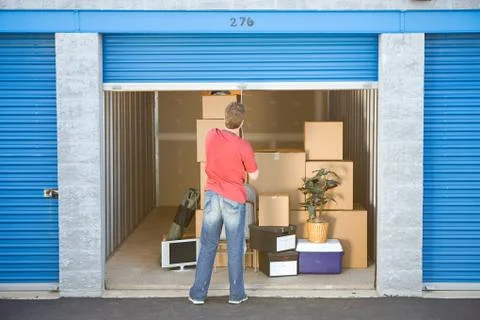 Storage: closing the storage unit door Stock Photos