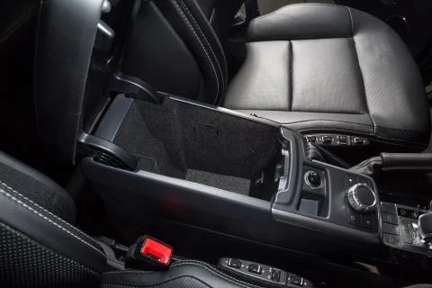 Storage compartment in car interior Stock Photos