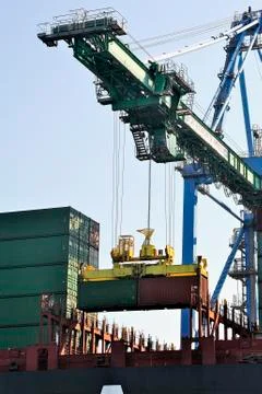 Storage of a container on the cargo liner Stock Photos