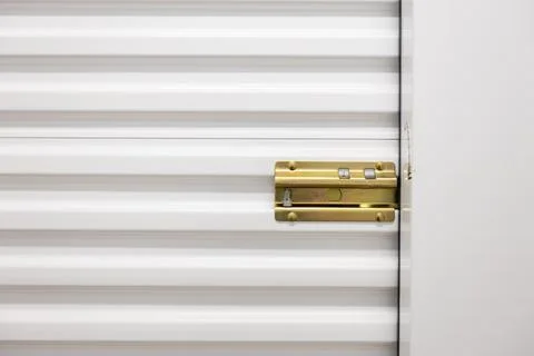 Storage door securing latch Stock Photos