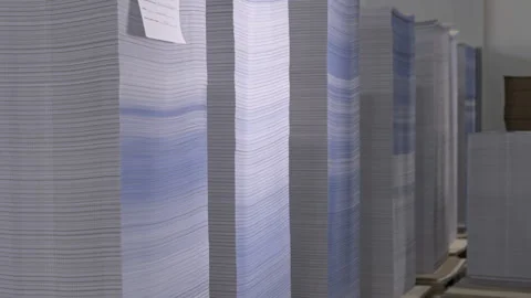 Storage with finished products in form of large paper stacks Stock Footage 303103835