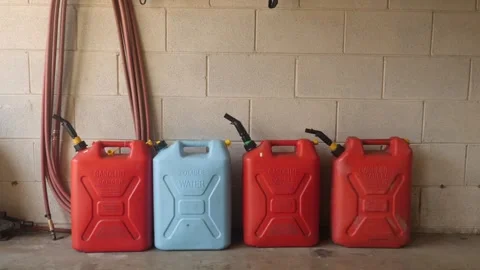Storage of fuel containers in a garage setting Stock Footage 311944350