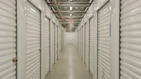 Storage hallway self storage building facility zoom in Video stock 249293679