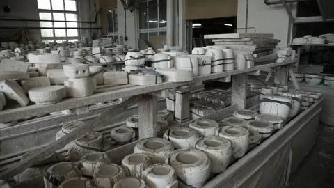 Storage of molds for baking earthenware. Wooden shelf. Slow panorama. Video stock 130526490