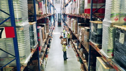 Storage premises with male engineers working Video stock 159337656