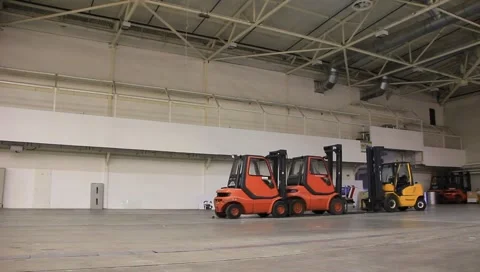 Storage room and forklift loaders Stock Footage